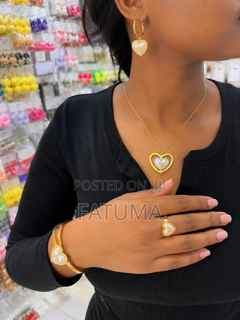 Matching Accessories Thus Earings, a Ring, Bracelet and Necklace