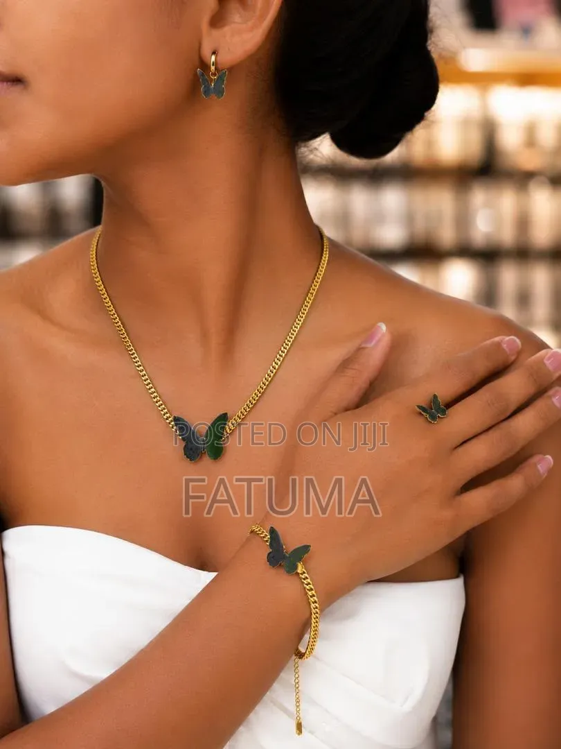 Matching Accessories Thus Earings, a Ring, Bracelet and Necklace