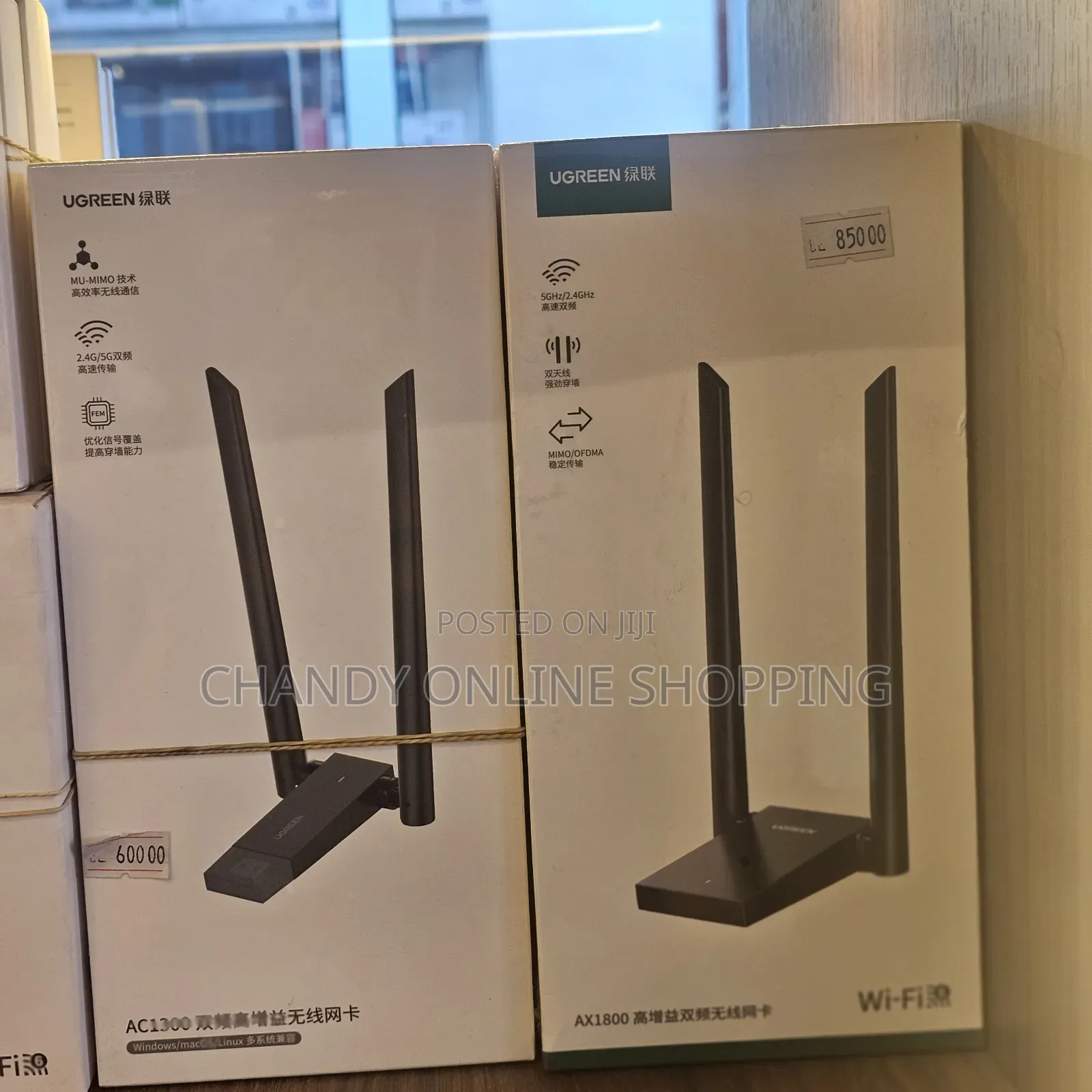 A UGREEN AC1300 Dual-Band High-Gain Wireless USB Adapter.