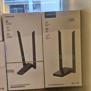 A UGREEN AC1300 Dual-Band High-Gain Wireless USB Adapter.