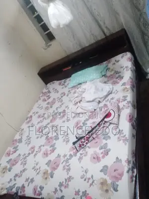 Kitanda Cha Mbao Ya Mninga