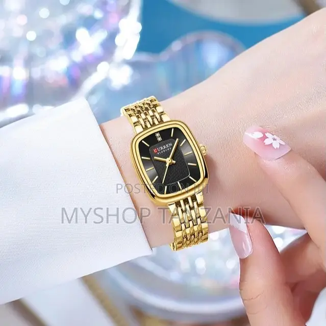 Curren 9093 Women's Wristwatch a Distinct Gold-Tone Rectangular Case