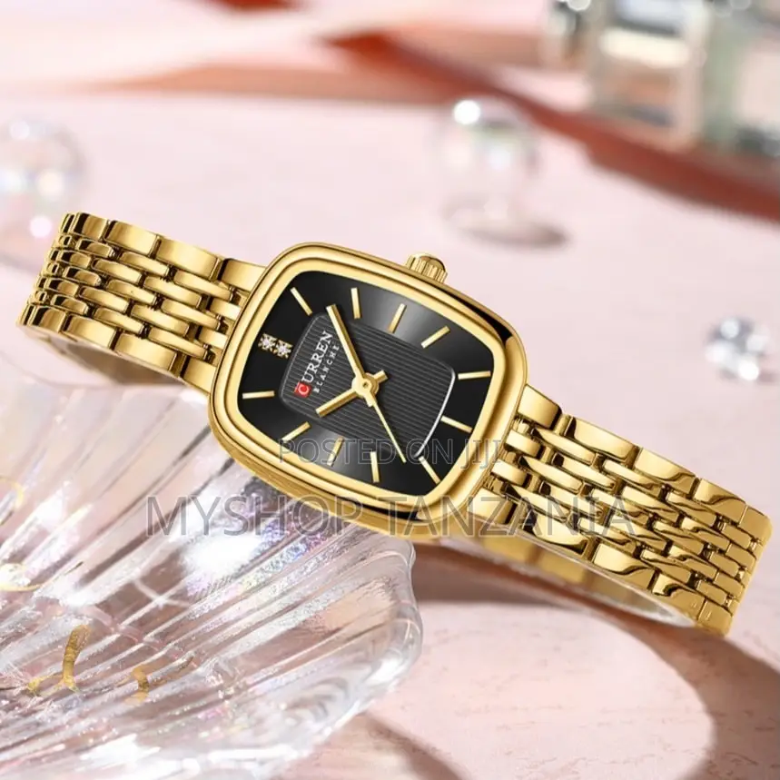 Curren 9093 Women's Wristwatch a Distinct Gold-Tone Rectangular Case