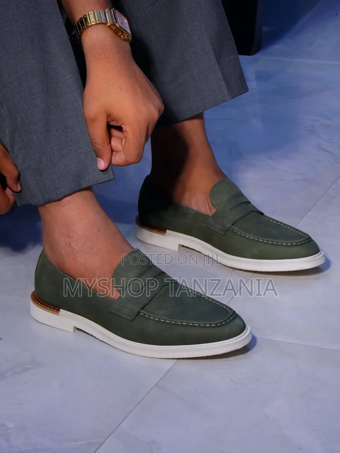 Santoni Leather Loafers Featuring a Thick White Rubber Sole