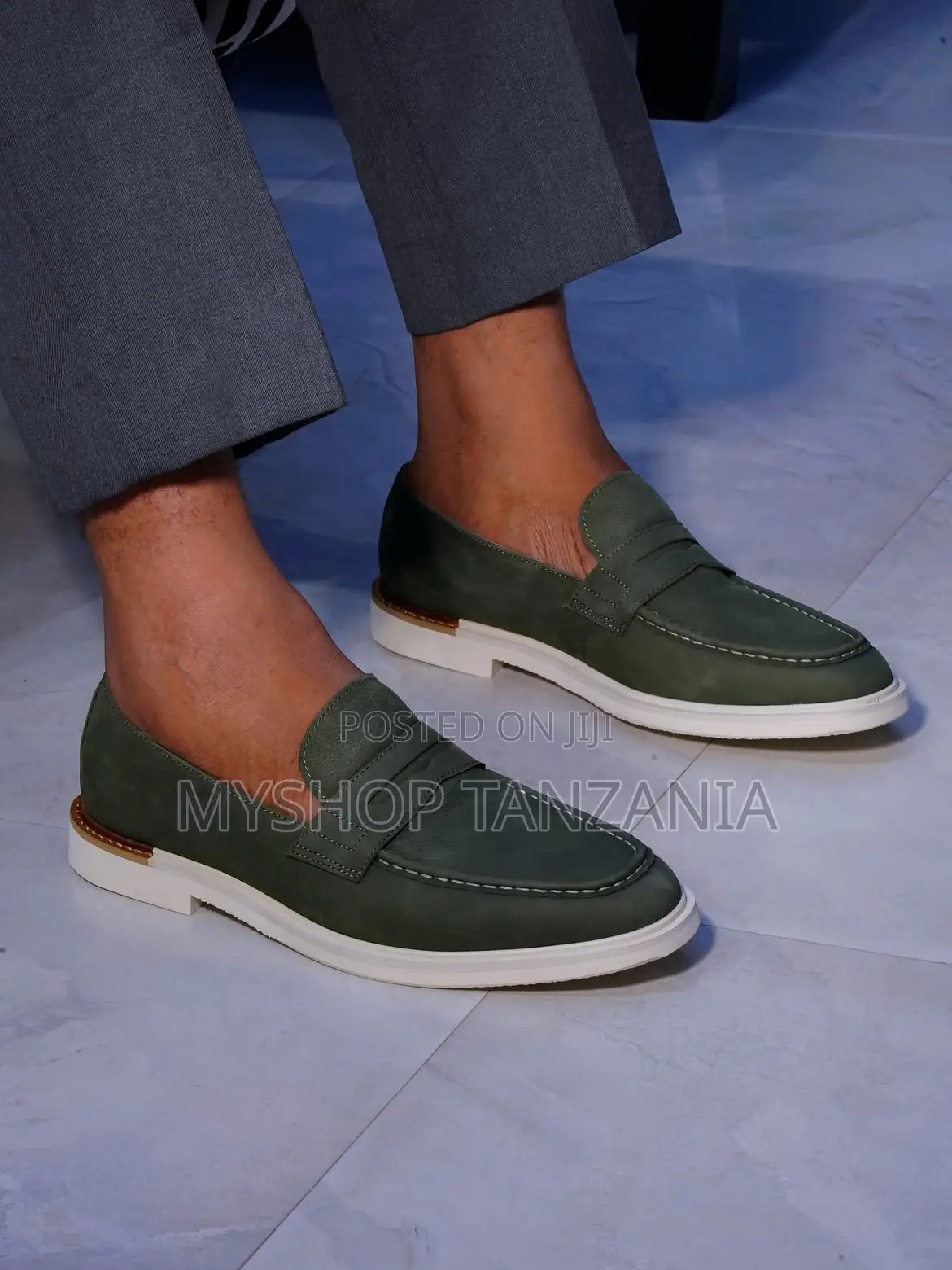 Santoni Leather Loafers Featuring a Thick White Rubber Sole