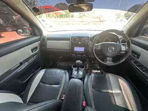 Mazda Verisa 2011 Red