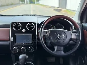 Mazda Verisa 2010 Red