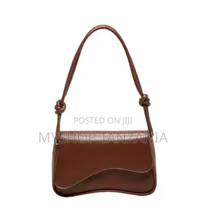 Brown SEEOR Asymmetrical Flap Shoulder Bag