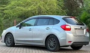 Subaru Impreza 2.0i Limited PZEV 4dr Hatchback AWD (2.0L 4cyl CVT) 2014