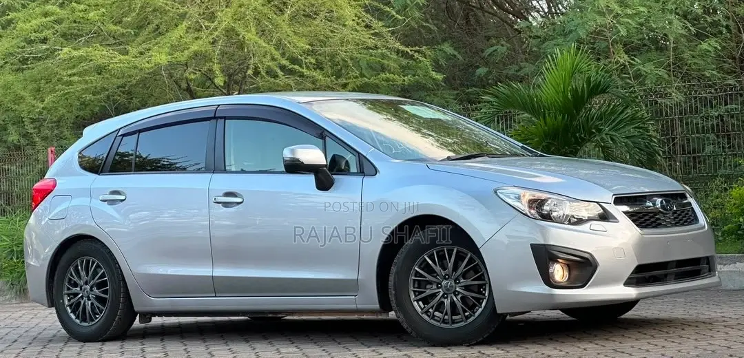 Subaru Impreza 2.0i Limited PZEV 4dr Hatchback AWD (2.0L 4cyl CVT) 2014