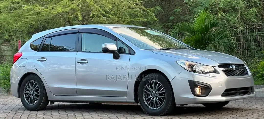 Subaru Impreza 2.0i Limited PZEV 4dr Hatchback AWD (2.0L 4cyl CVT) 2014