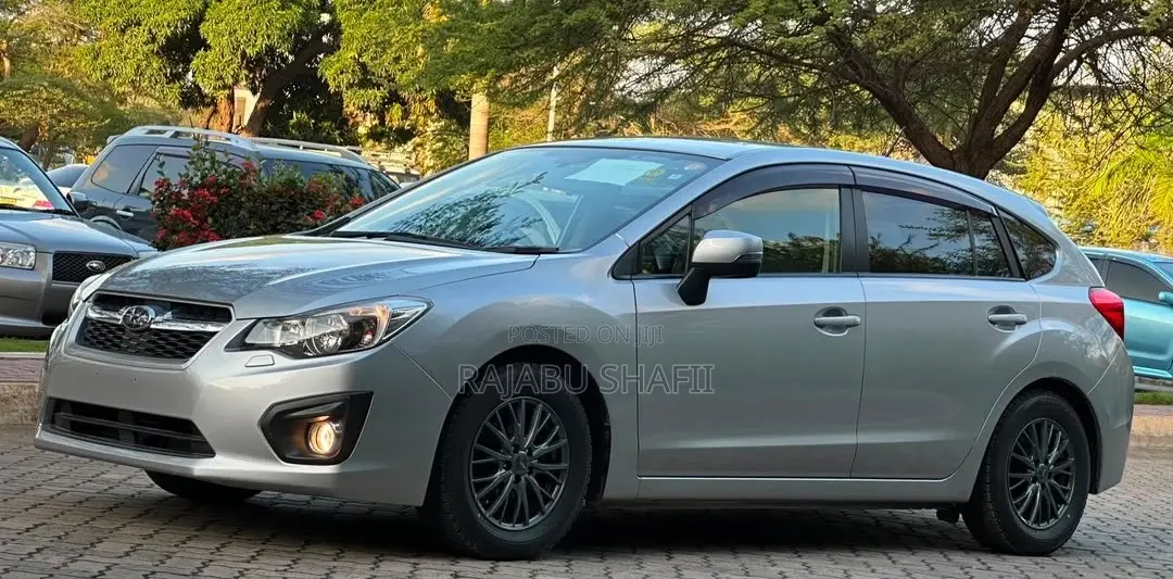 Subaru Impreza 2.0i Limited PZEV 4dr Hatchback AWD (2.0L 4cyl CVT) 2014