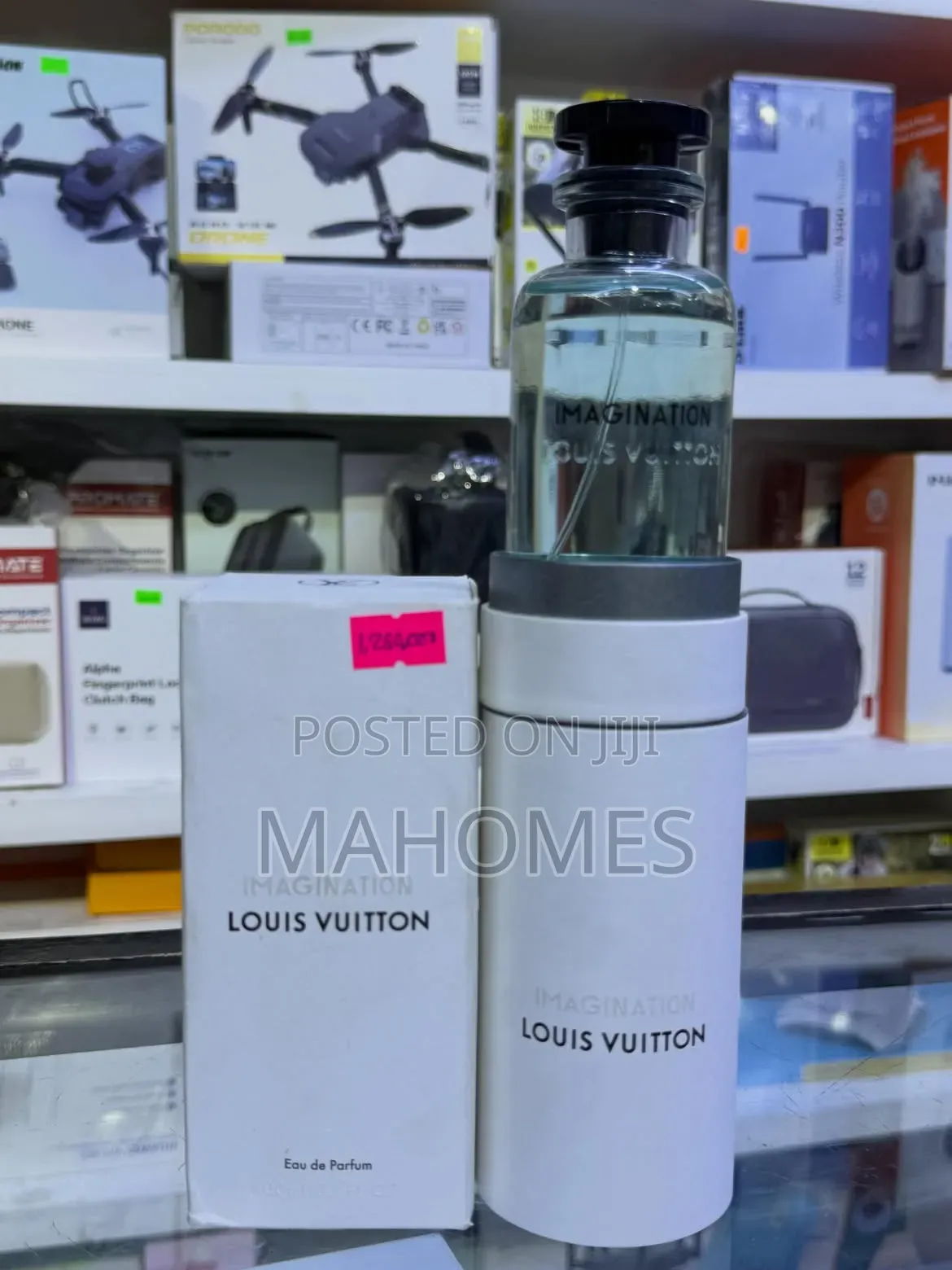 Louis Vuitton Imagination Eau De Parfum in Its Cylindrical White