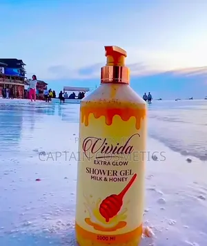 Oga Na Mng'ao Wa Asili Kwa Vivida Extra Glow Shower Gel!"