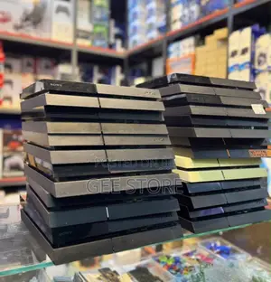 Ps4 Fat Original With Two Controllers and Games (Complete Set)