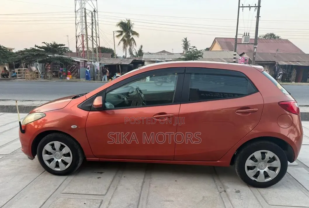 Mazda Demio 2009 Orange
