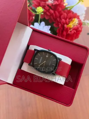 Black Casio Wristwatch Quartz Dial Featuring Red Strap