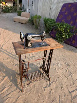 Sewing Machine// Charahani //