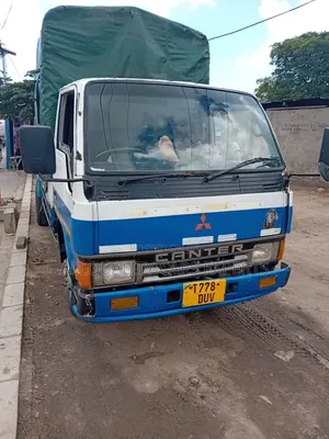 Mitsubishi Canter Cargo Engine 4d33 1998 White