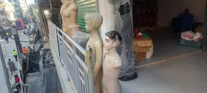 Madoli Ya Kutangazia Nguo Dukani