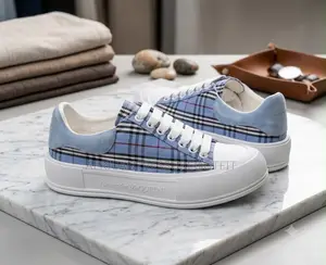 Alexander McQueen Platform Sneaker Feature a Vibrant Plaid Pattern