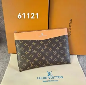 Louis Vuitton Pochette Voyage Souple Crafted With Natural Leather Trim