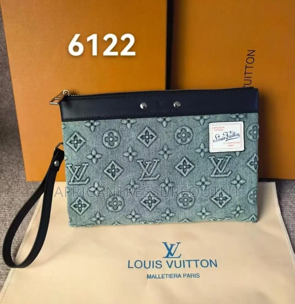 Louis Vuitton Pochette Voyage Souple Crafted With Natural Leather Trim