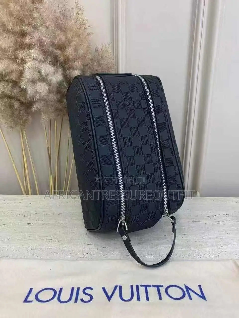 Louis Vuitton Doppkit Feature Embossed Iconic Monogram Pattern