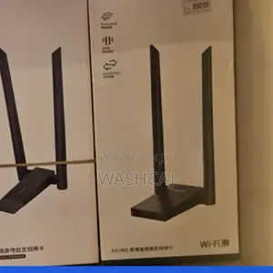 A UGREEN AC1300 Dual-Band High-Gain Wireless USB Adapter.