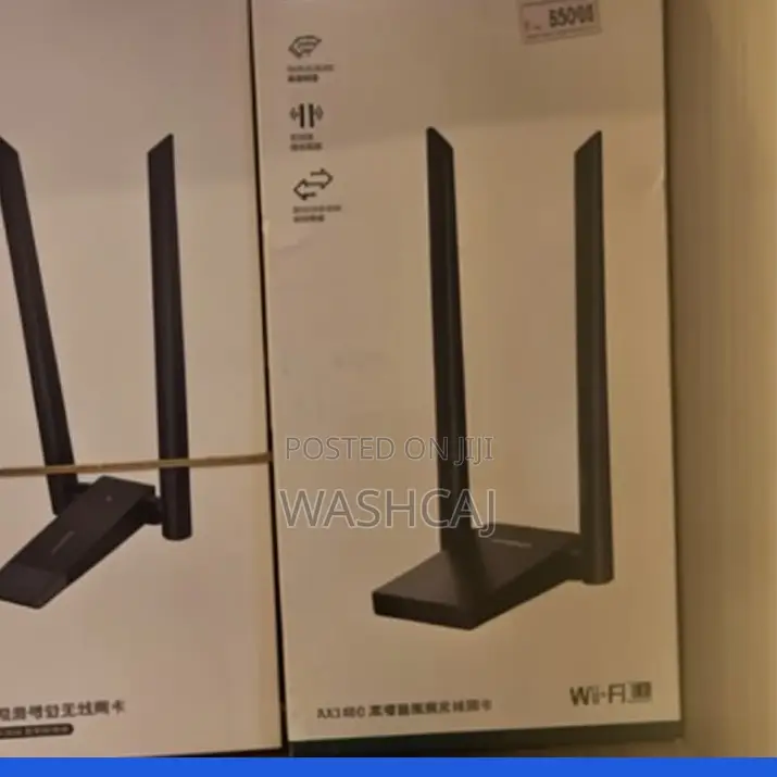 A UGREEN AC1300 Dual-Band High-Gain Wireless USB Adapter.