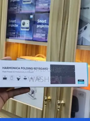 Harmonica Folding Keyboard Bluetooth Connection and Built-in Touchpad.