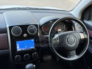 Mazda Verisa 2009 Pearl