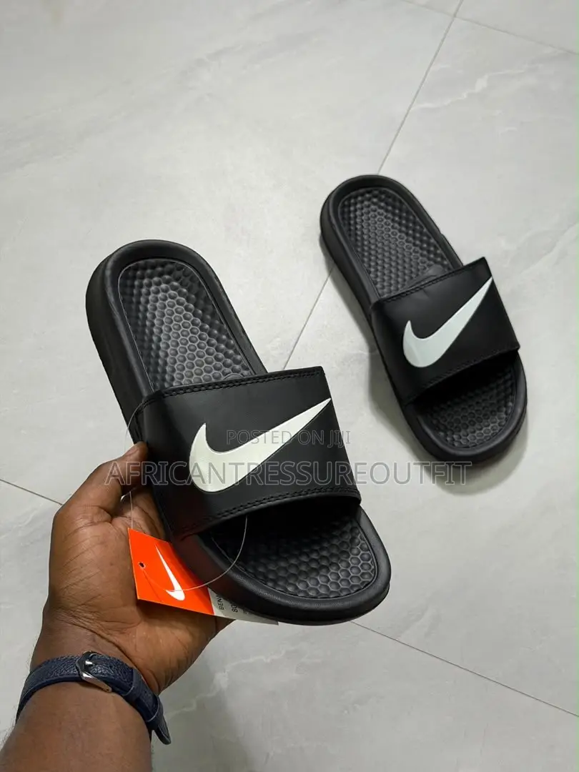 NIKE BENASSI SLIDES Feature a Textured Footbed