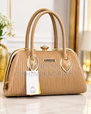 premium Ladies Handbagprice: 50,000/= Tu!