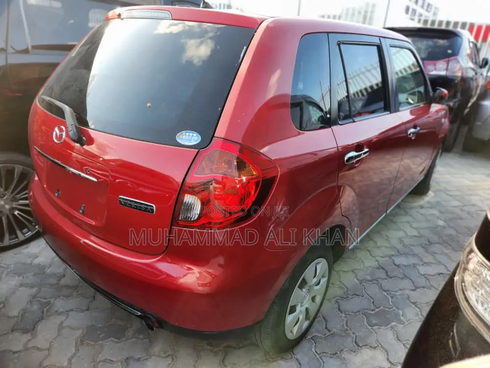 Mazda Verisa 2013 Red