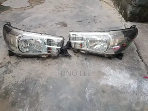 Pair of Genuine Hilux Revo Halogen Headlights