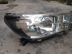 Pair of Genuine Hilux Revo Halogen Headlights