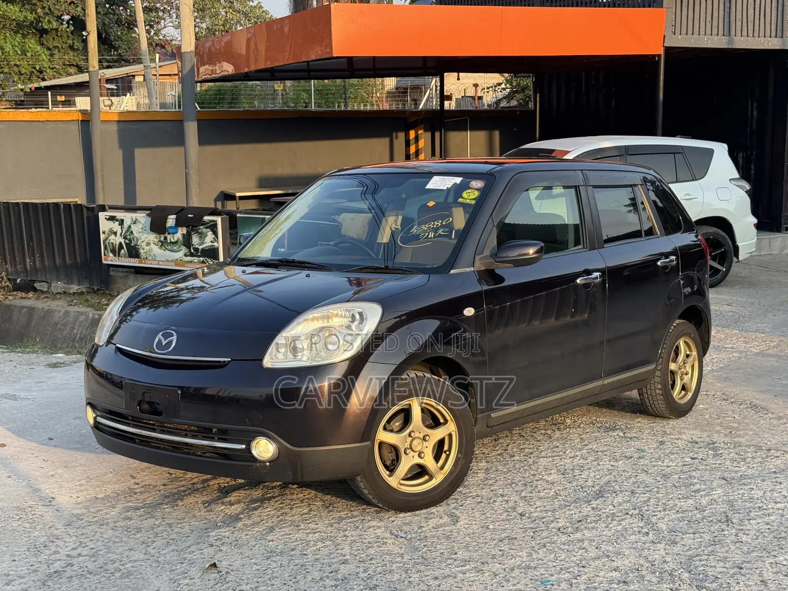 Mazda Verisa 2011 Brown