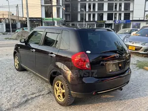 Mazda Verisa 2011 Brown