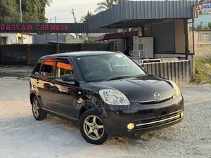 Mazda Verisa 2011 Brown