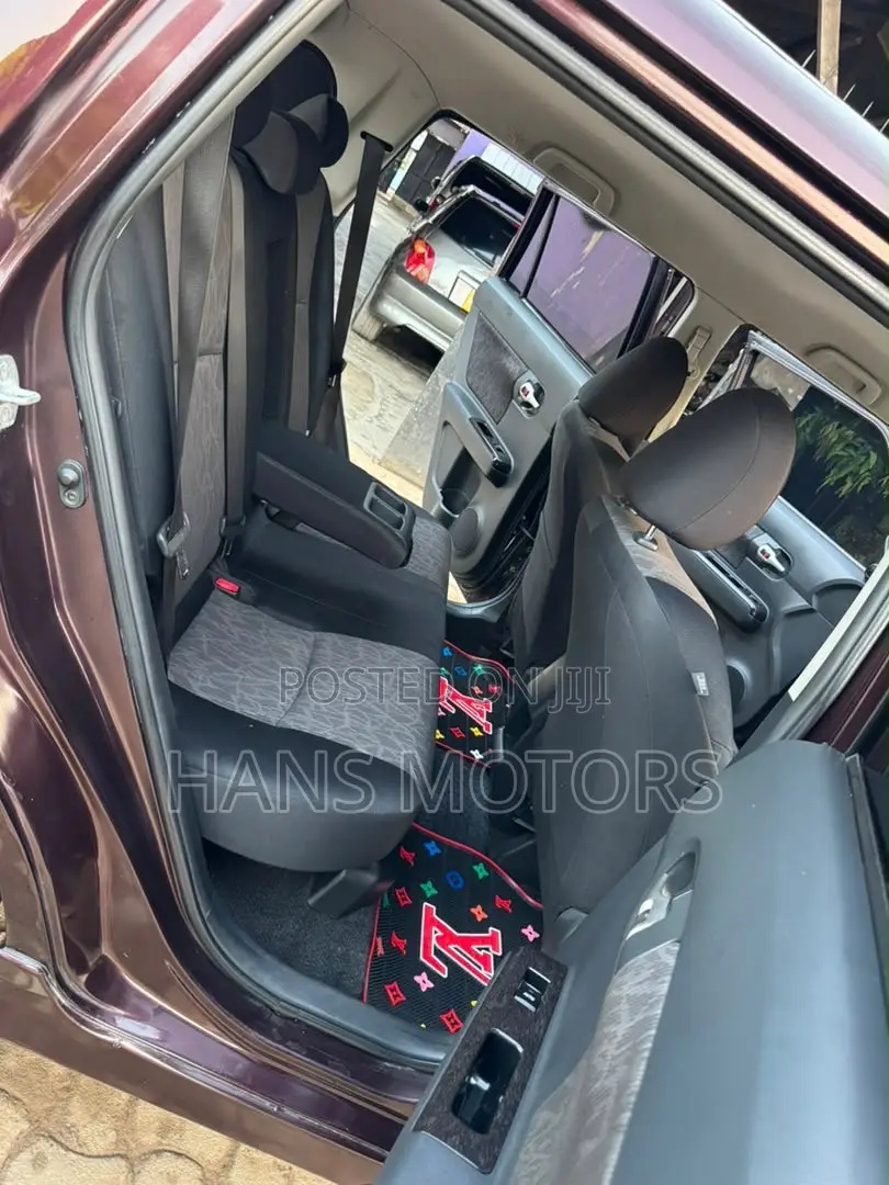 Toyota Corolla Rumion 2010 Burgundy