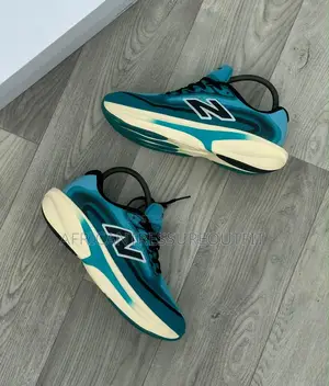 New Balance Ellipse V1 Sneakers Feature a Distinctive Curved Midsole