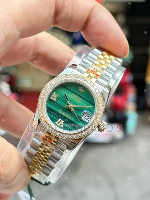 Rolex 
Date Just for Men
Mechanical