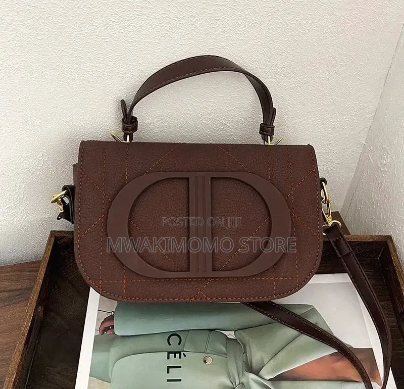 Small / Mini Top-Handle Saddle Crossbody Bag.