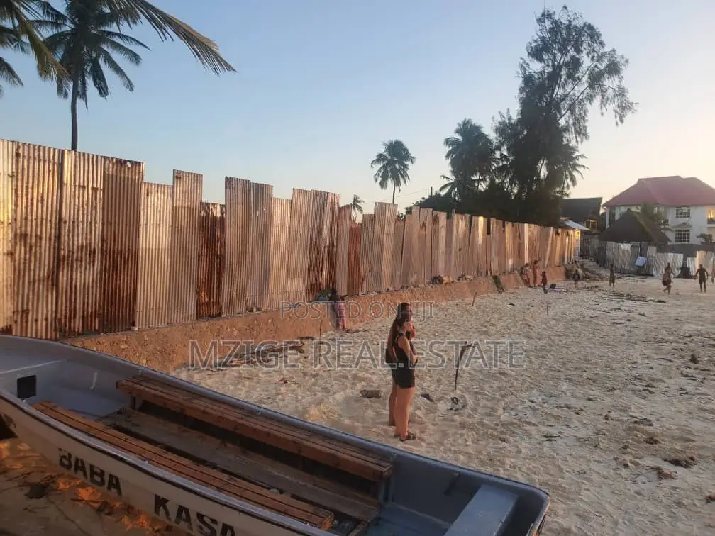 2 Acres of Prime White Sand Beachfront Land for Sale