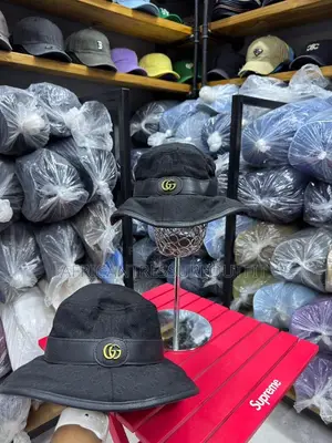 Loewe Denim Buckets Hats Feature a Prominent White Logo Patch on Front