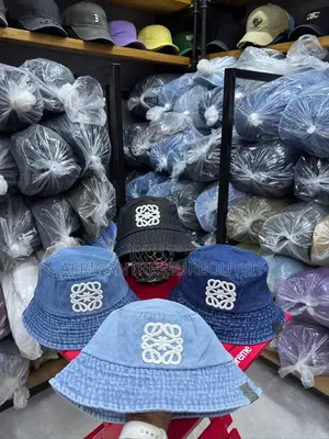 Loewe Denim Buckets Hats Feature a Prominent White Logo Patch on Front