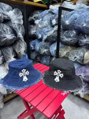 Loewe Denim Buckets Hats Feature a Prominent White Logo Patch on Front