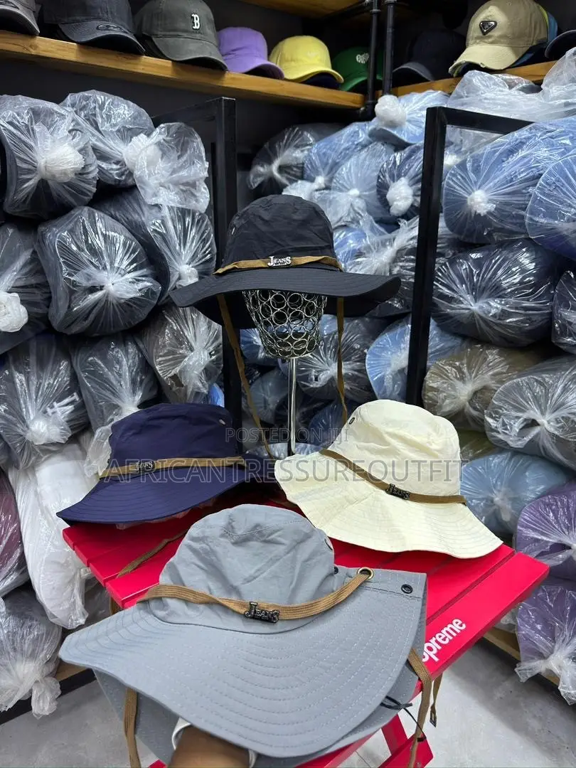 Loewe Denim Buckets Hats Feature a Prominent White Logo Patch on Front