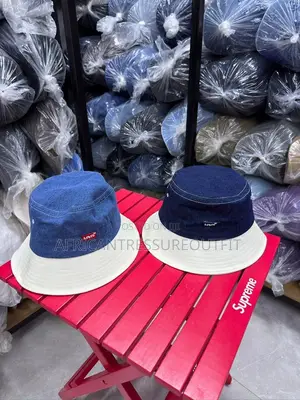 Loewe Denim Buckets Hats Feature a Prominent White Logo Patch on Front